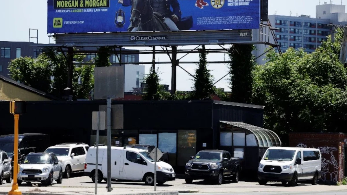 Morgan & Morgan billboard photographed in Somerville in a Reuters source image